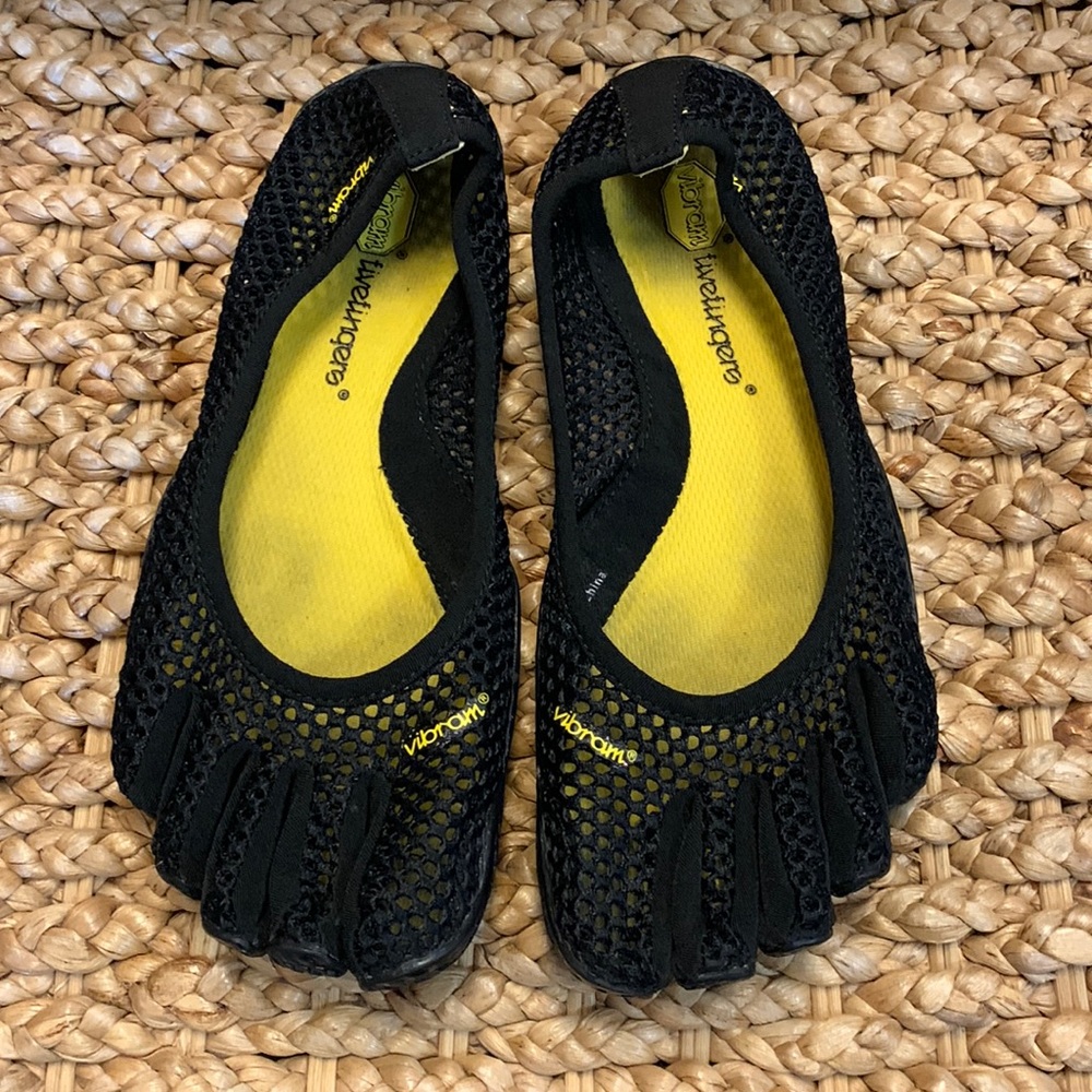 Women’s Vibram five finger toe shoes.